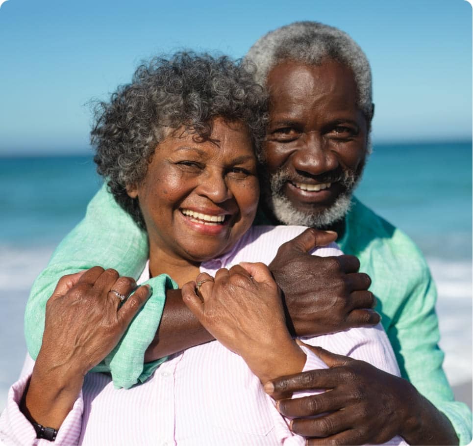 Couple by the beach, happy after taking part in a clinical trial